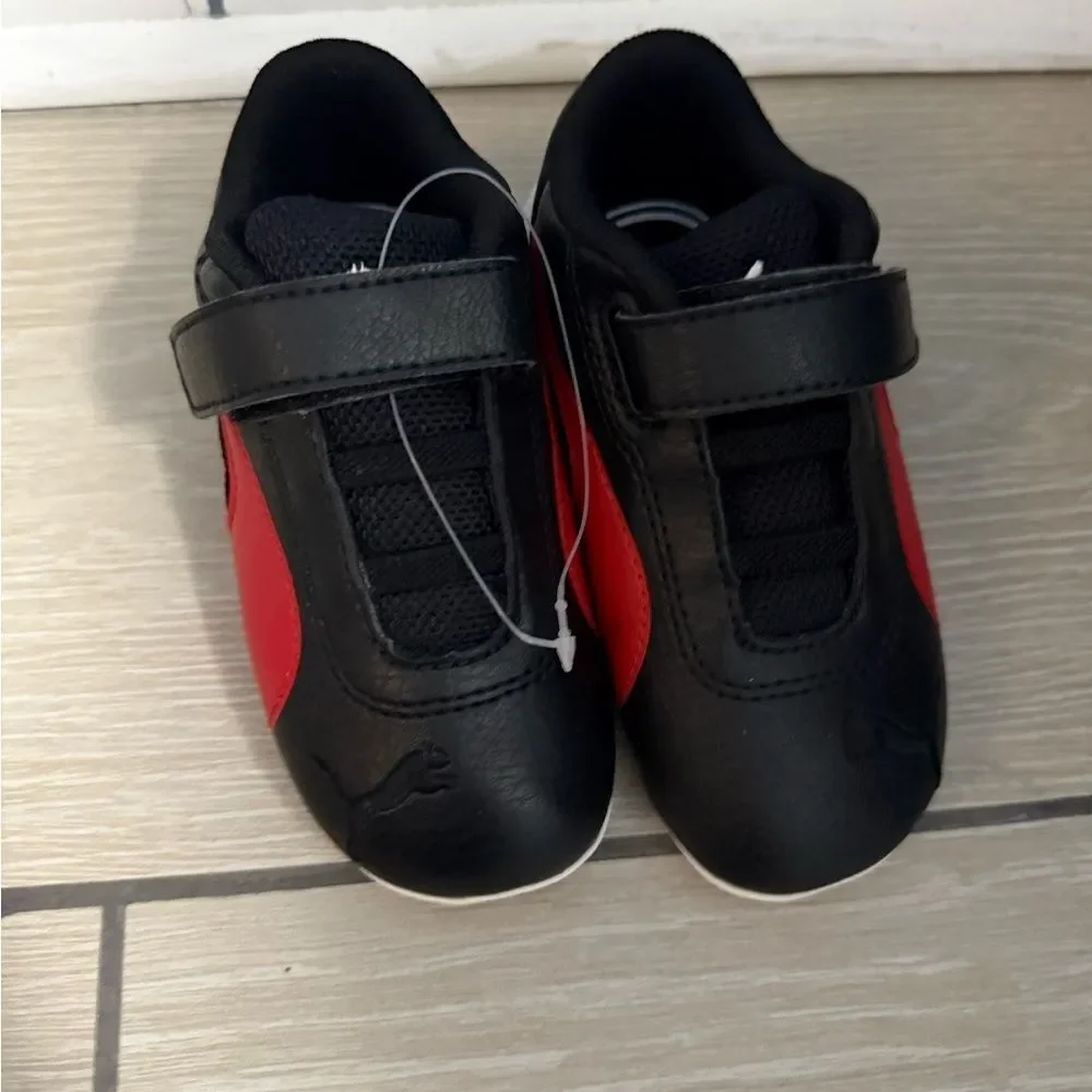 Brand new Puma Kids Black and Red Sneakers